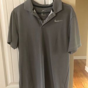 Nike golf polo.  Nice, fabric/dry fit gray tweed. Non-smoking home. Like new.